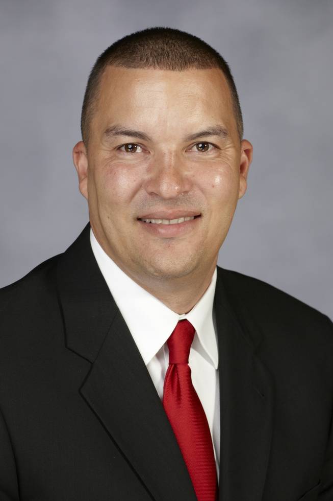Assistant head coach Justin Hutson from the UNLV Men's Runnin' Rebels Basketball Team poses Aug. 31, 2012 at the University of Nevada, Las Vegas. 